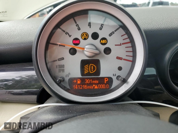 2010 MINI Hardtop S with VIN WMWMF7C5XATW89025, listed as a Copart auction lot 56106705 with 141,216 mi miles and Salvage title. Bid and sale history available at DreamBid. Image 9.