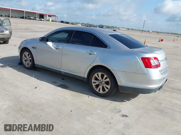 2012 Ford Taurus SEL z VIN 1FAHP2EWXCG136371, wystawiony jako IAAI lot #42455393 z przebiegiem 188 134 mil mil oraz . Historia ofert i sprzedaży dostępna na DreamBid. Obrazek 3.