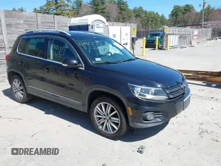 2012 Volkswagen Tiguan SEL with VIN WVGAV7AX2CW529232, listed as a IAAI auction lot 41955121 with 164,885 mi miles and . Bid and sale history available at DreamBid. Image 1.