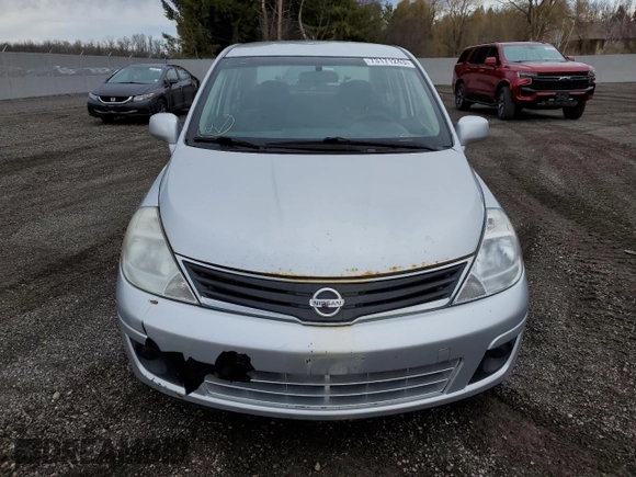 2010 Nissan Versa 1.6 with VIN 3N1CC1AP9AL355388, listed as a Copart auction lot 73171243 with 141,394 mi miles and Clean Title. Bid and sale history available at carsss.com. Image 5.