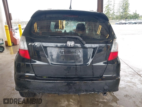 2013 Honda Fit Sport with VIN JHMGE8H57DC033384, listed as a IAAI auction lot 41871356 with 150,777 mi miles. Bid and sale history available at carsss.com. Image 15.