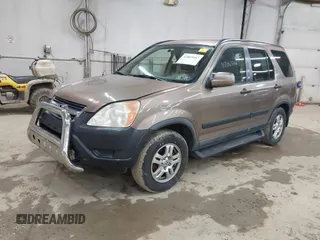 2004 Honda CR-V EX with VIN JHLRD78814C057877, listed as a IAAI auction lot 42065687 with 220,207 mi miles and . Bid and sale history available at carsss.com. Image 2.
