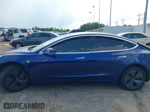 2019 Tesla Model 3 Mid Range z VIN 5YJ3E1EA8KF308947, wystawiony jako IAAI lot #39617997 z przebiegiem 70 831 mil mil oraz . Historia ofert i sprzedaży dostępna na DreamBid. Obrazek 14.