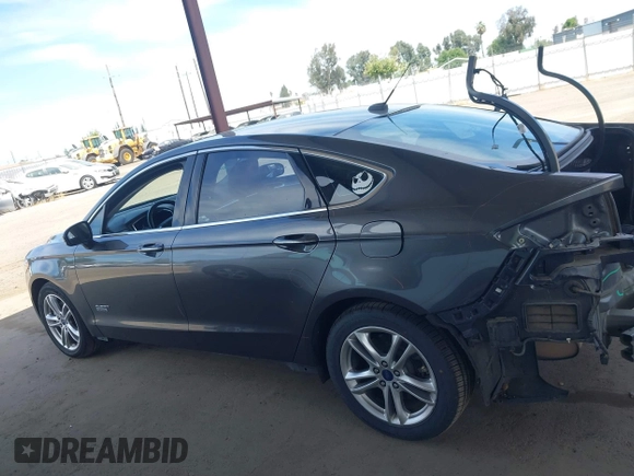 2016 Ford Fusion Titanium with VIN 3FA6P0SU9GR134575, listed as a IAAI auction lot 42338427 with 123,765 mi miles and . Bid and sale history available at DreamBid. Image 15.