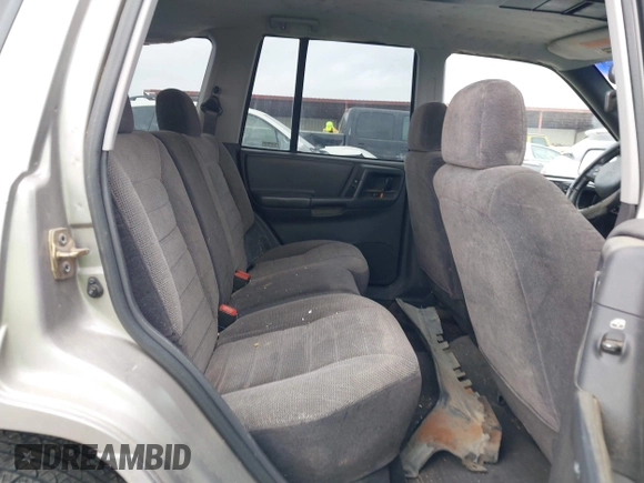 1998 Jeep Grand Cherokee Laredo with VIN 1J4FX58S6WC354101, listed as a IAAI auction lot 42158671 with 289,318 mi miles and . Bid and sale history available at DreamBid. Image 8.