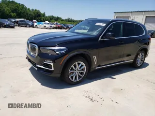 2020 BMW X5 sDrive40i with VIN 5UXCR4C06L9B84934, listed as a Copart auction lot 57621263 with 23,969 mi miles and Salvage title. Bid and sale history available at DreamBid. Image 1.
