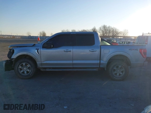 2021 Ford F-150 XL with VIN 1FTFW1E56MFA46051, listed as a IAAI auction lot 41342210 with 94,729 mi miles. Bid and sale history available at carsss.com. Image 14.