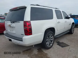 2011 Chevrolet Suburban LT with VIN 1GNSCJE05BR392834, listed as a IAAI auction lot 42141087 with 251,359 mi miles and . Bid and sale history available at DreamBid. Image 4.
