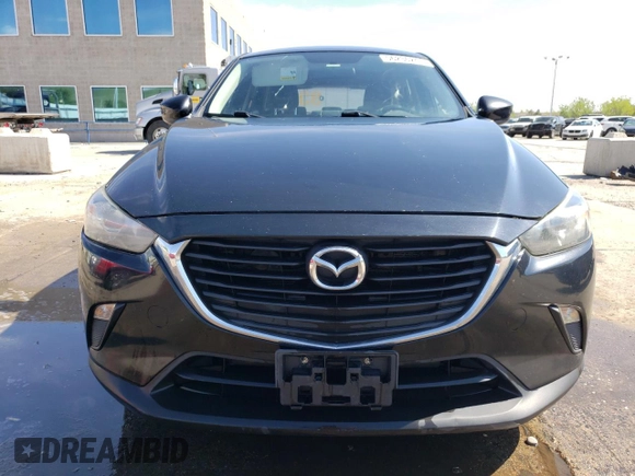 2016 Mazda CX-3 Sport z VIN JM1DKBB72G0106476, wystawiony jako Copart lot #56236245 z przebiegiem 161 207 mil mil oraz Szkody całkowita. Historia ofert i sprzedaży dostępna na DreamBid. Obrazek 5.