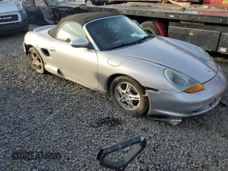 2000 Porsche Boxster z VIN WP0CA2980YU626179, wystawiony jako Copart lot #44728325 z przebiegiem 103 173 mil mil oraz Szkody całkowita. Historia ofert i sprzedaży dostępna na DreamBid. Obrazek 4.