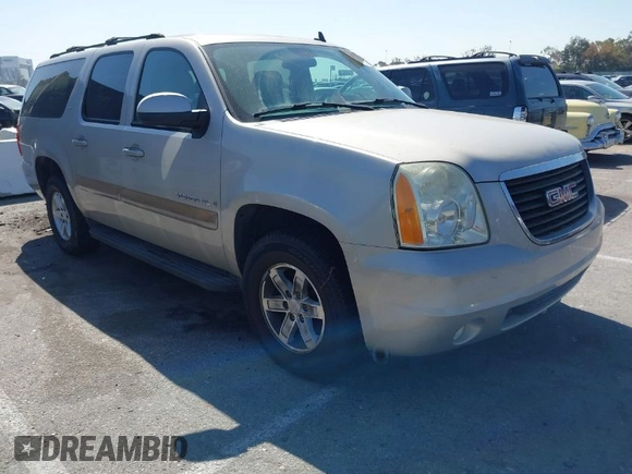 2007 GMC Yukon XL SLT with VIN 1GKFC16077R187116, listed as a IAAI auction lot 42020184 with 195,721 mi miles. Bid and sale history available at carsss.com. Image 1.