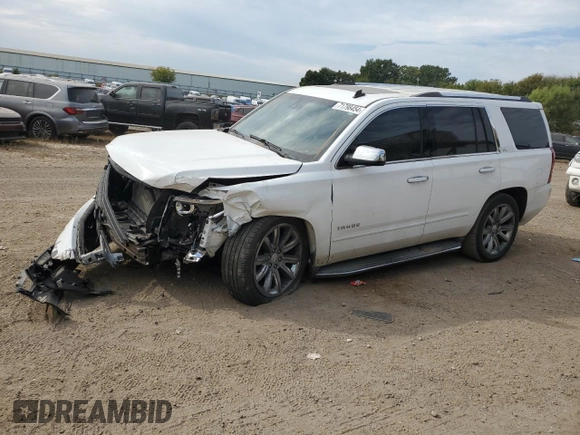 2015 Chevrolet Tahoe LTZ with VIN 1GNSKCKC1FR310018, listed as a Copart auction lot 71798454 with 244,179 mi miles and Salvage title. Bid and sale history available at DreamBid. Image 1.