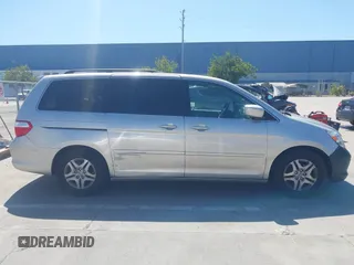 2006 Honda Odyssey EX-L with VIN 5FNRL38766B038599, listed as a IAAI auction lot 41989217 with 164,118 mi miles. Bid and sale history available at carsss.com. Image 14.