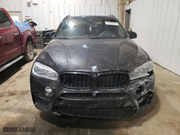 2015 BMW X5 M with VIN 5YMKT6C58F0C89657, listed as a Copart auction lot 77462264 with 110,706 mi miles and Clean Title. Bid and sale history available at carsss.com. Image 5.