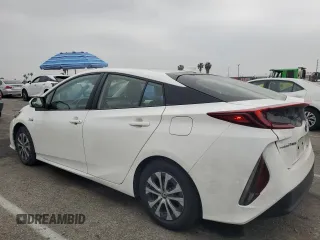 2021 Toyota Prius LE z VIN JTDKAMFP9M3196770, wystawiony jako Copart lot #54309555 z przebiegiem 21 948 mil mil oraz Szkoda całkowita • Salvage title. Historia ofert i sprzedaży dostępna na DreamBid. Obrazek 2.
