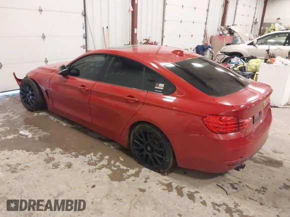 2015 BMW 4 Series 428i with VIN WBA4A9C52FGL85049, listed as a IAAI auction lot 41649475 with 100,443 mi miles and . Bid and sale history available at DreamBid. Image 3.