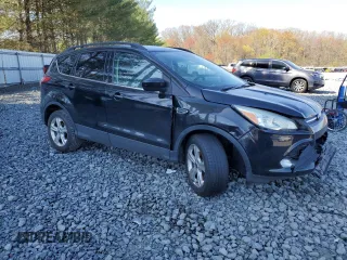 2016 Ford Escape SE with VIN 1FMCU9GX4GUC04677, listed as a Copart auction lot 53531765 with 88,355 mi miles and Salvage Title. Bid and sale history available at carsss.com. Image 4.