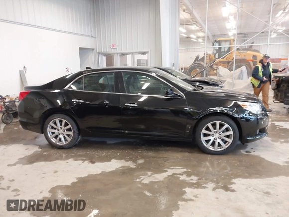 2013 Chevrolet Malibu LTZ with VIN 1G11H5SA1DU129095, listed as a IAAI auction lot 41556006 with 170,477 mi miles and . Bid and sale history available at DreamBid. Image 13.
