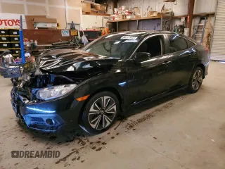 2017 Honda Civic Sedan EX-L with VIN 2HGFC1F75HH650589, listed as a Copart auction lot 77036554 with 130,080 mi miles and Clean Title. Bid and sale history available at carsss.com. Image 1.