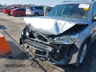 2011 Volkswagen Tiguan SE with VIN WVGBV7AX2BW562055, listed as a IAAI auction lot 41642084 with 175,407 mi miles and . Bid and sale history available at DreamBid. Image 6.