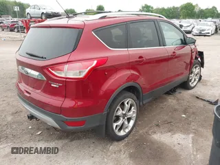 2015 Ford Escape Titanium with VIN 1FMCU9J96FUC02177, listed as a IAAI auction lot 42312928 with 100,716 mi miles and . Bid and sale history available at DreamBid. Image 4.