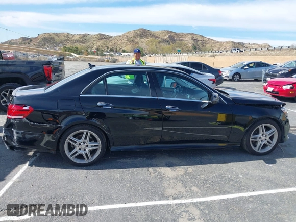2014 Mercedes-Benz E 350 Sport with VIN WDDHF5KBXEA889555, listed as a IAAI auction lot 41589052 with 148,422 mi miles and . Bid and sale history available at DreamBid. Image 13.