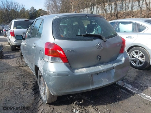 2010 Toyota Yaris with VIN JTDKT4K33A5293606, listed as a IAAI auction lot 41574444 with 262,584 mi miles. Bid and sale history available at carsss.com. Image 17.