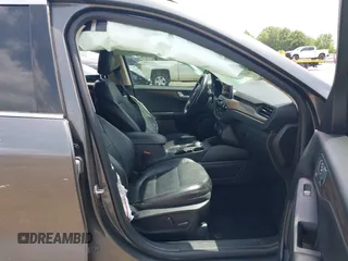 2020 Ford Escape Titanium with VIN 1FMCU9J94LUB19570, listed as a IAAI auction lot 42134031 with 110,248 mi miles and . Bid and sale history available at DreamBid. Image 5.