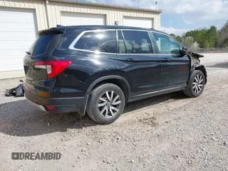 2019 Honda Pilot EX-L with VIN 5FNYF5H5XKB008027, listed as a IAAI auction lot 41794539 with 110,832 mi miles and . Bid and sale history available at carsss.com. Image 4.