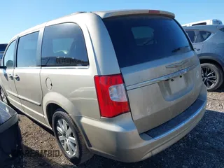2014 Chrysler Town & Country Touring with VIN 2C4RC1BG2ER224267, listed as a IAAI auction lot 41750220 with 209,377 mi miles. Bid and sale history available at carsss.com. Image 3.
