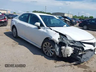 2019 Toyota Camry LE with VIN 4T1B11HK4KU180995, listed as a IAAI auction lot 42088737 with 133,813 mi miles and . Bid and sale history available at DreamBid. Image 1.