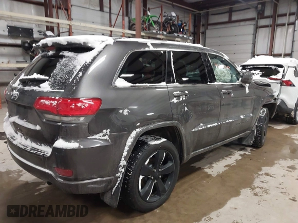 2015 Jeep Grand Cherokee Laredo with VIN 1C4RJFAGXFC752489, listed as a IAAI auction lot 41382389 with 147,892 mi miles. Bid and sale history available at carsss.com. Image 4.