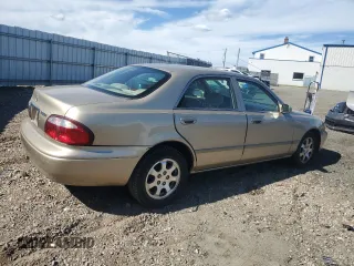 2001 Mazda 626 LX with VIN 1YVGF22C815231985, listed as a Copart auction lot 74913884 with 52,699 mi miles and Clean Title. Bid and sale history available at carsss.com. Image 3.