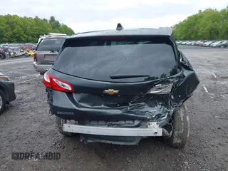 2019 Chevrolet Equinox LT z VIN 3GNAXUEVXKL219346, wystawiony jako IAAI lot #42320431 z przebiegiem 98 660 mil mil oraz . Historia ofert i sprzedaży dostępna na DreamBid. Obrazek 16.
