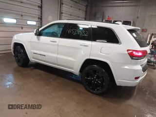 2015 Jeep Grand Cherokee Laredo with VIN 1C4RJFAG4FC660665, listed as a IAAI auction lot 41529532 with 124,099 mi miles. Bid and sale history available at carsss.com. Image 3.