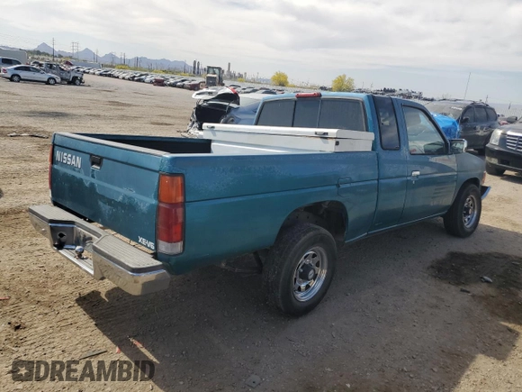1995 Nissan Frontier XE z VIN 1N6HD16S7SC401954, wystawiony jako Copart lot #52923105 z przebiegiem 98 441 mil mil oraz Szkoda całkowita • Salvage title. Historia ofert i sprzedaży dostępna na DreamBid. Obrazek 3.