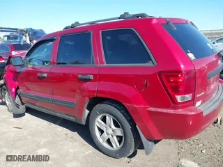 2005 Jeep Grand Cherokee Laredo with VIN 1J4GR48K55C651268, listed as a IAAI auction lot 41987117 with 189,974 mi miles. Bid and sale history available at carsss.com. Image 15.