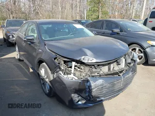 2015 Toyota Avalon Limited with VIN 4T1BK1EB5FU157586, listed as a IAAI auction lot 41827250 with 62,572 mi miles and . Bid and sale history available at carsss.com. Image 1.