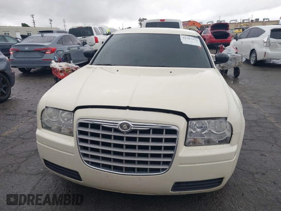 2006 Chrysler 300 with VIN 2C3KA43RX6H470150, listed as a IAAI auction lot 41767272 with 107,457 mi miles. Bid and sale history available at carsss.com. Image 12.