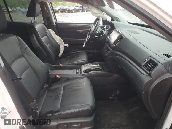2023 Honda Ridgeline RTL-E with VIN 5FPYK3F78PB015187, listed as a Copart auction lot 57655465 with 57,704 mi miles and Salvage title. Bid and sale history available at DreamBid. Image 7.