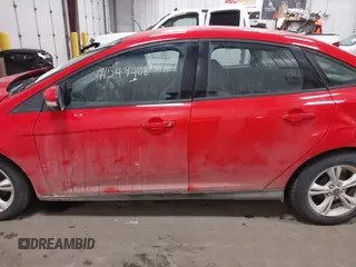 2013 Ford Focus SE z VIN 1FADP3F20DL352710, wystawiony jako IAAI lot #41549408 z przebiegiem 97 460 mil mil oraz . Historia ofert i sprzedaży dostępna na DreamBid. Obrazek 15.