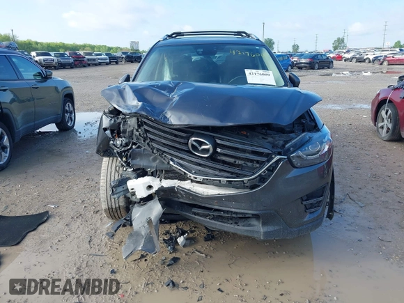 2016 Mazda CX-5 Grand Touring with VIN JM3KE4DYXG0724183, listed as a IAAI auction lot 42176009 with 152,695 mi miles and . Bid and sale history available at DreamBid. Image 6.