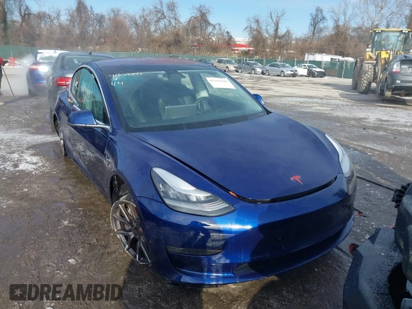 2018 Tesla Model 3 Long Range Battery with VIN 5YJ3E1EB8JF115138, listed as a IAAI auction lot 41343399 with 62,351 mi miles and . Bid and sale history available at DreamBid. Image 13.