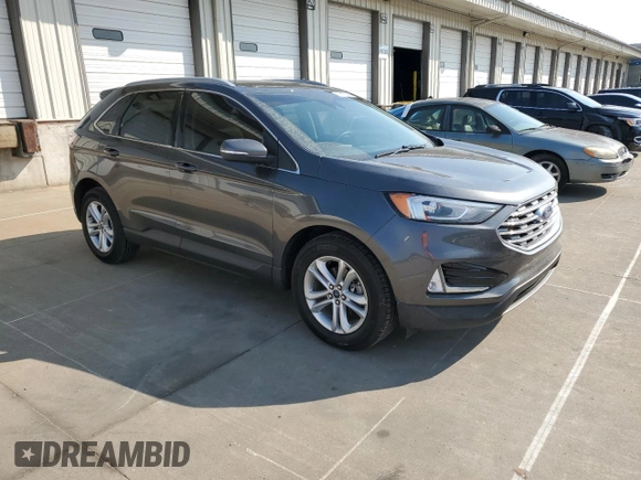 2020 Ford Edge SEL с VIN 2FMPK3J97LBB58552, выставлен на аукционе Copart как лот 58472995 с пробегом 71 387 миль миль и Списание • Salvage title. История ставок и продаж доступна на DreamBid. Изображение 4.