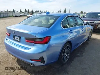2022 BMW 3 Series 330e with VIN 3MW5P7J01N8C37289, listed as a IAAI auction lot 41765524 with 1 mi miles. Bid and sale history available at carsss.com. Image 4.