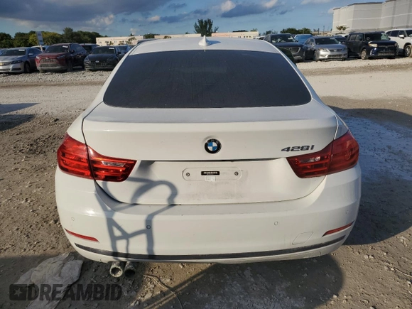 2015 BMW 4 Series 428i with VIN WBA4A5C50FG052177, listed as a Copart auction lot 86093994 with 127,956 mi miles and Salvage Title. Bid and sale history available at DreamBid. Image 6.