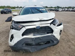 2021 Toyota RAV4 Hybrid LE with VIN 4T3B6RFV8MU056574, listed as a Copart auction lot 56977735 with 19,032 mi miles and Salvage title. Bid and sale history available at DreamBid. Image 5.