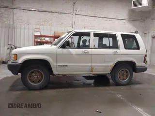 1994 Isuzu Trooper с VIN JACDH58V9R7919182, выставлен на аукционе IAAI как лот 42333093 с пробегом 192 819 миль миль и . История ставок и продаж доступна на DreamBid. Изображение 14.