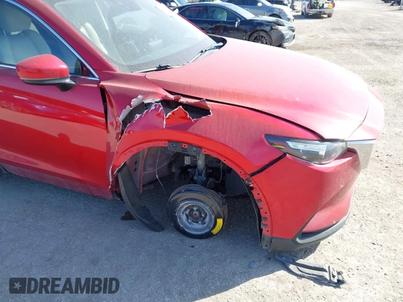 2016 Mazda CX-9 Touring z VIN JM3TCBCY7G0100311, wystawiony jako IAAI lot #41588448 z przebiegiem 115 364 mil mil oraz . Historia ofert i sprzedaży dostępna na DreamBid. Obrazek 6.