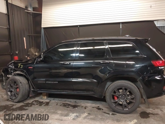2017 Jeep Grand Cherokee SRT with VIN 1C4RJFDJ9HC819478, listed as a IAAI auction lot 41325490 with 63,551 mi miles. Bid and sale history available at carsss.com. Image 14.